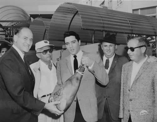 Governor Al Rosellini and Elvis with leg of ham