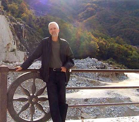 Eric Scigliano, portrait against landscape